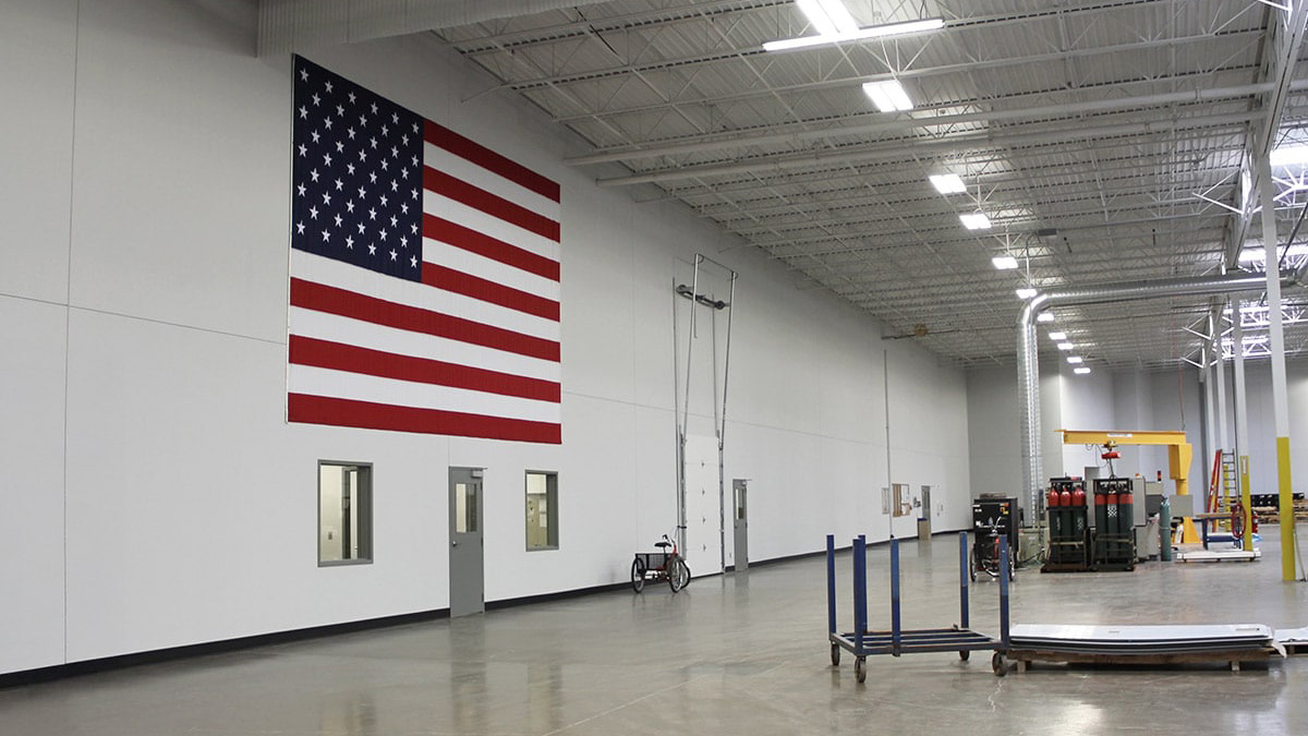 U.S. flag on manufacturing floor at Willoughby Industries